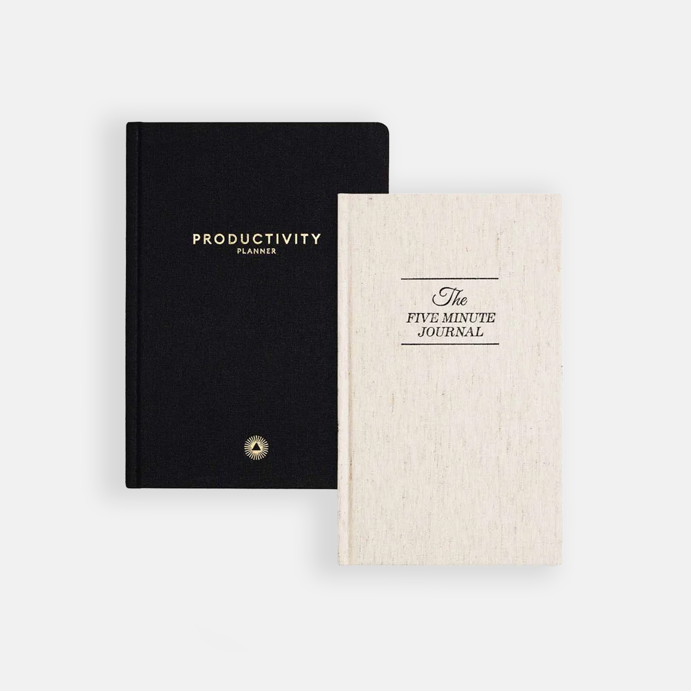 Must Productivity Planner päevik ja valge The Five Minute Journal päevik. 