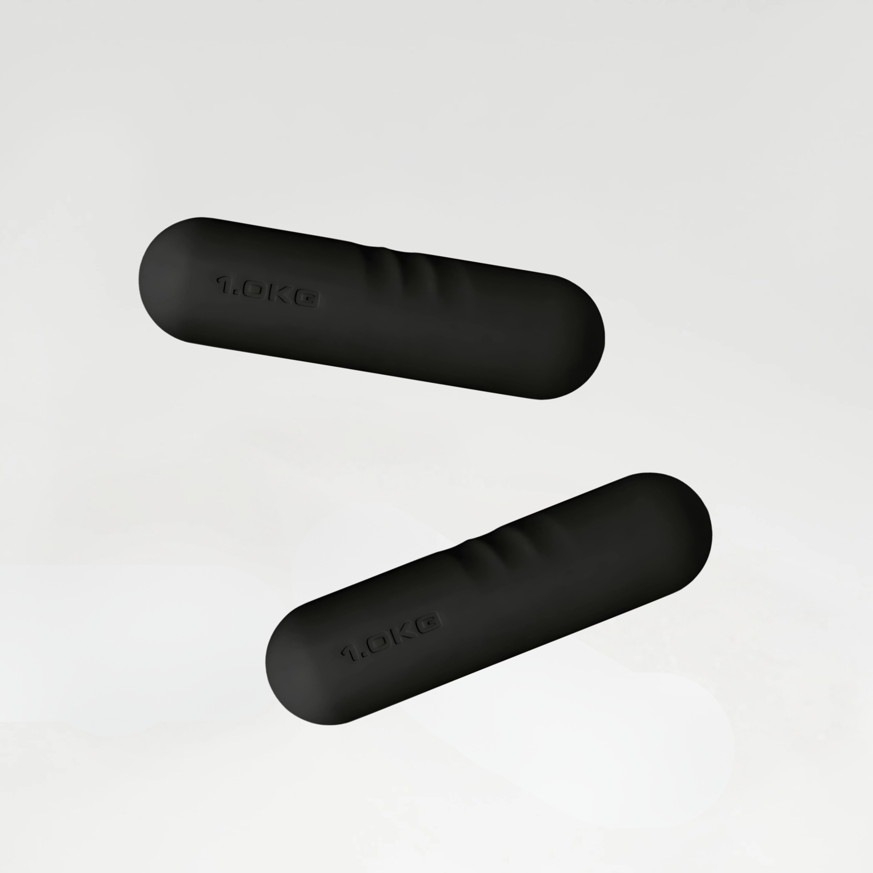 1 kg musta värvi hantlipaar mati viimistlusega, mõeldud kergeteks jõutreeninguteks ja koduseks treeninguks